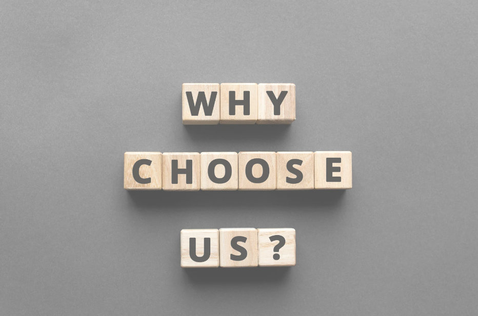 wooden blocks with the letters printed on them arranged in a phrase stating "why choose us?"